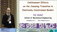 Confinement Effects on the Jamming Transition in Kinetically - Constrained Models